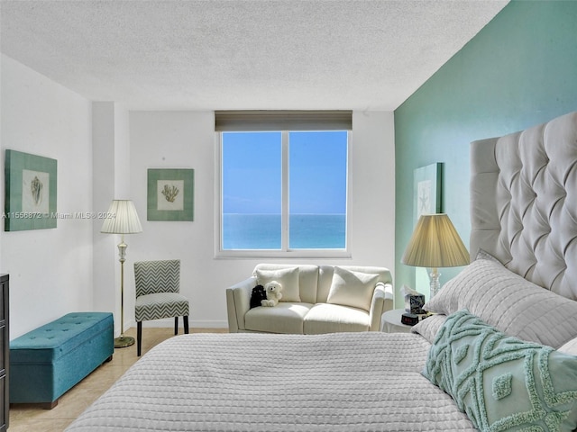 bedroom featuring a textured ceiling