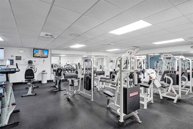 gym with a drop ceiling