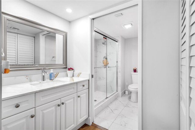 701 SW 142nd Ave Unit 108S, Pembroke Pines, FL 33027 - full bathroom with marble finish floors, vanity, a marble finish shower, and toilet