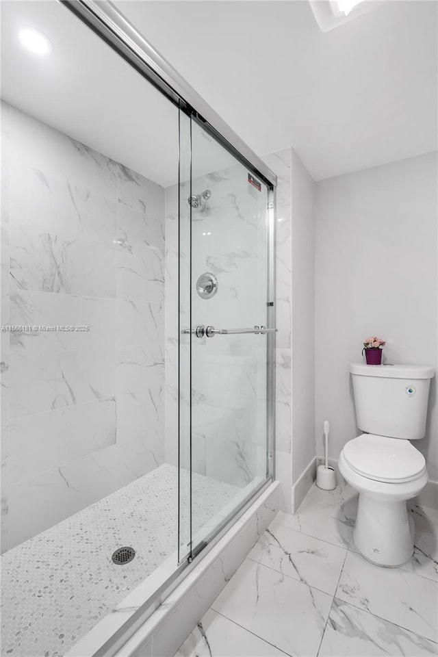 701 SW 142nd Ave Unit 108S, Pembroke Pines, FL 33027 - full bathroom with a marble finish shower, toilet, marble finish flooring, and baseboards