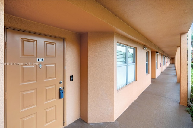 701 SW 142nd Ave Unit 108S, Pembroke Pines, FL 33027 - view of exterior entry with stucco siding