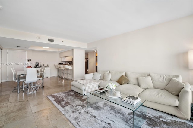 living room with light tile floors