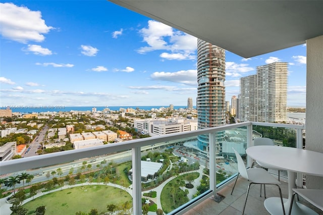 balcony featuring a water view