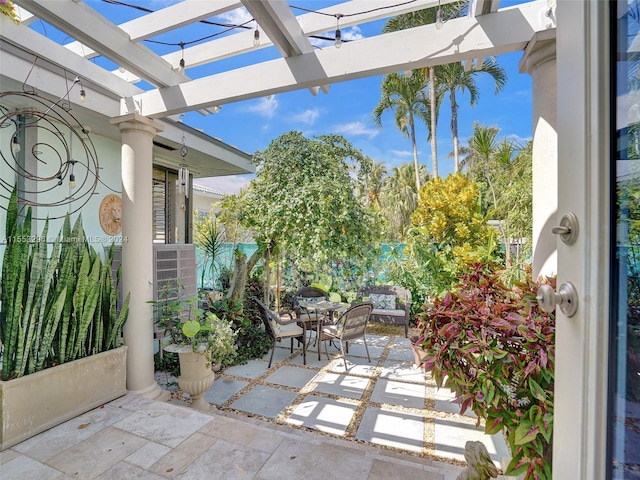 view of terrace with a pergola