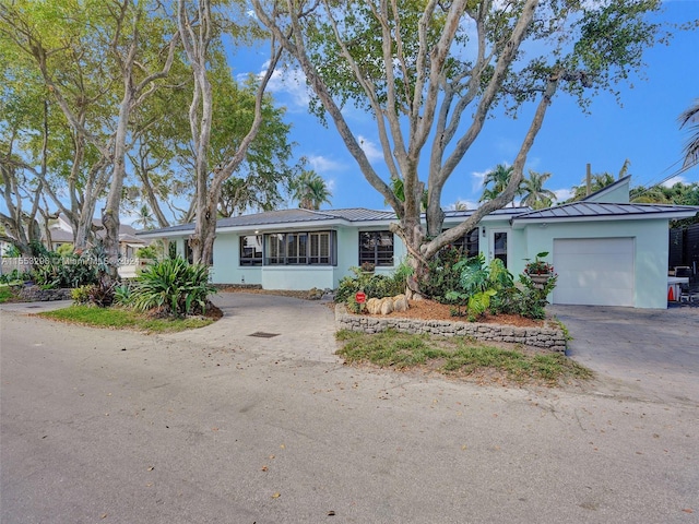 single story home with a garage