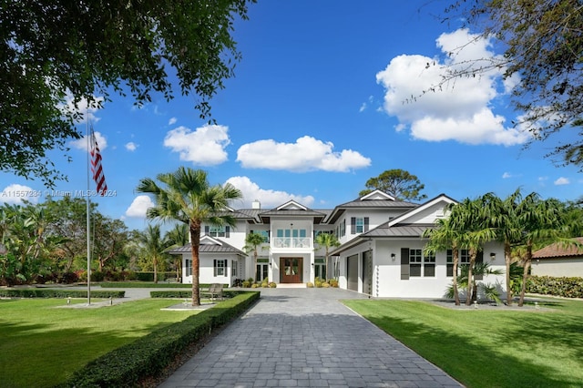 exterior space featuring a front yard and a garage