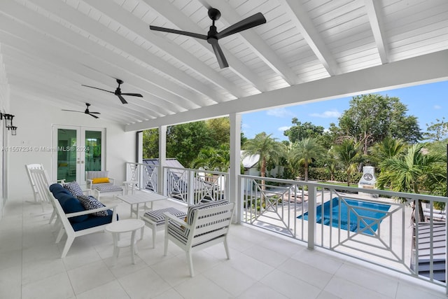 view of patio with outdoor lounge area and ceiling fan