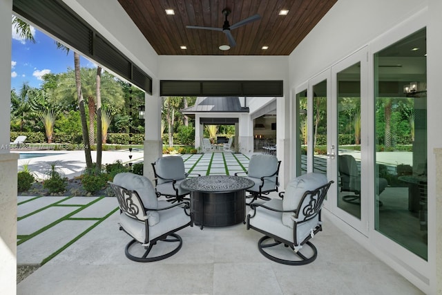 view of patio featuring ceiling fan