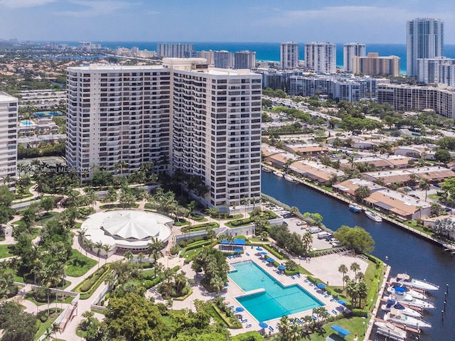 birds eye view of property featuring a water view