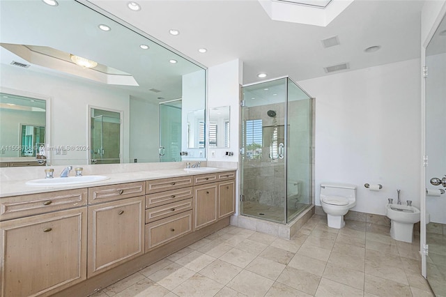 bathroom with a skylight, a bidet, dual bowl vanity, an enclosed shower, and tile patterned floors