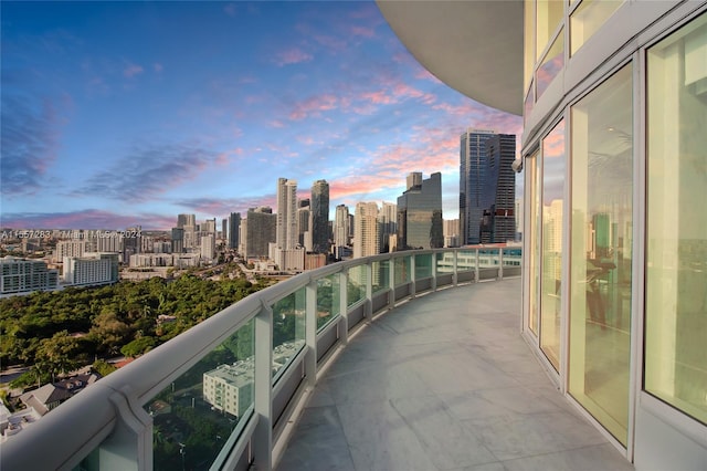 view of balcony at dusk