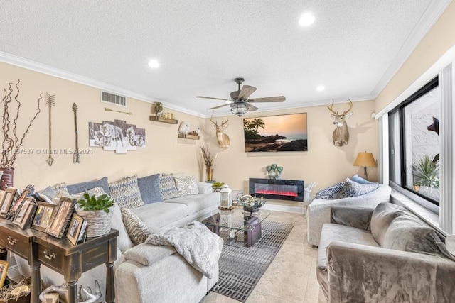 living room with light tile floors, a textured ceiling, crown molding, and ceiling fan