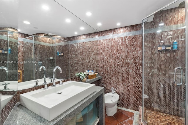 bathroom with a bidet, vanity, shower with separate bathtub, tile walls, and tile floors