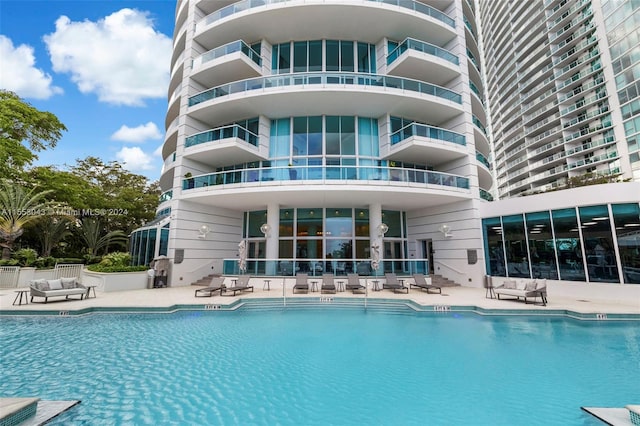 view of pool featuring a patio area