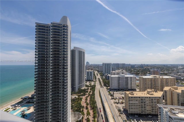 property's view of city with a water view