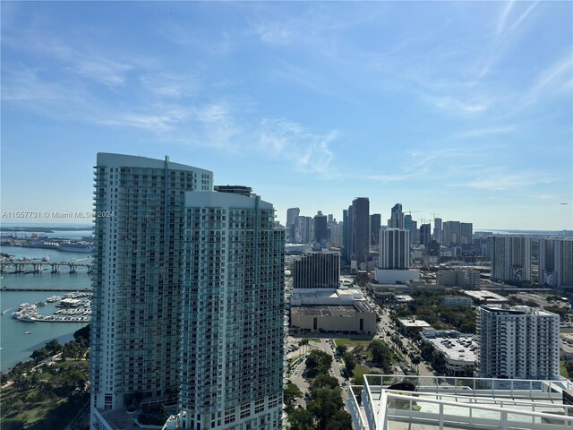 property's view of city featuring a water view