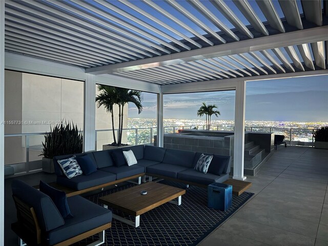 view of patio / terrace featuring a pergola and outdoor lounge area