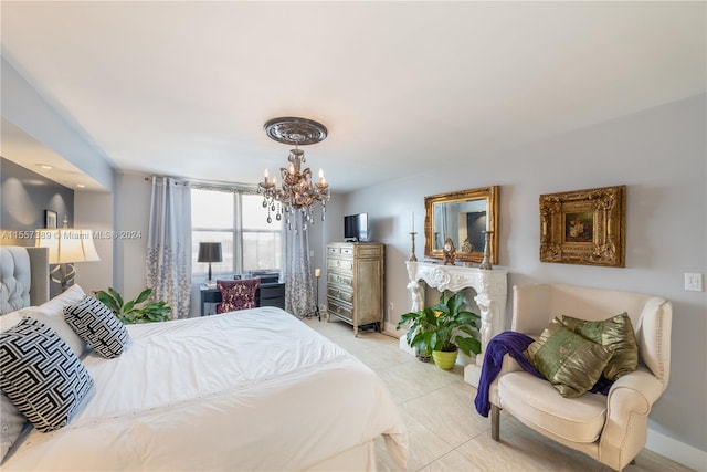 tiled bedroom with an inviting chandelier