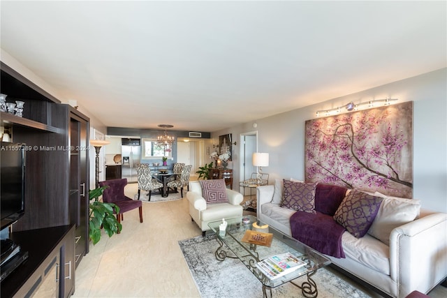 living room with a notable chandelier