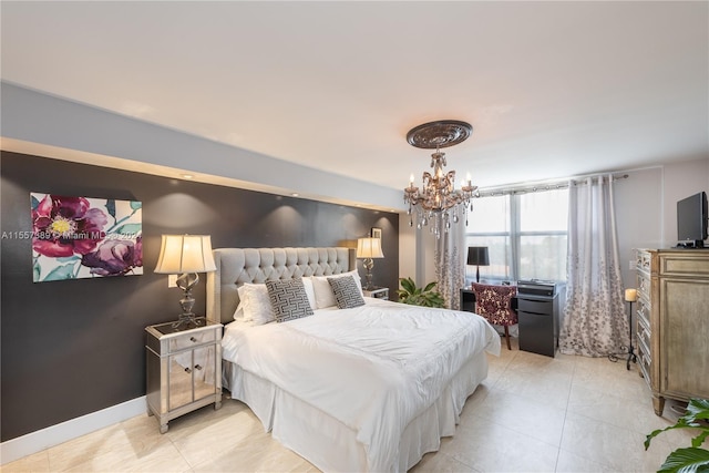 bedroom featuring a notable chandelier and light tile floors