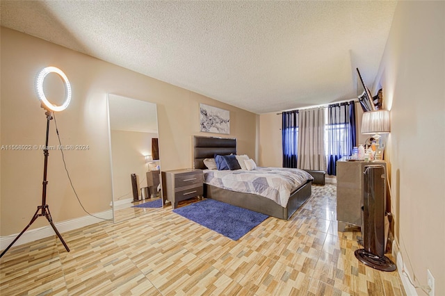 bedroom featuring a textured ceiling