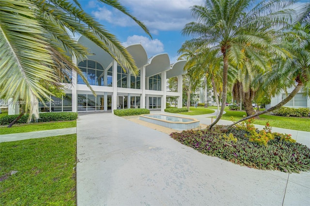 exterior space featuring a front yard