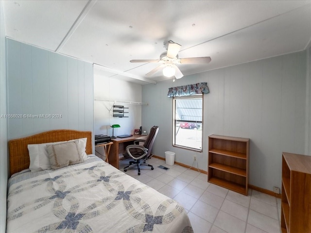 bedroom featuring ceiling fan and light tile flooring