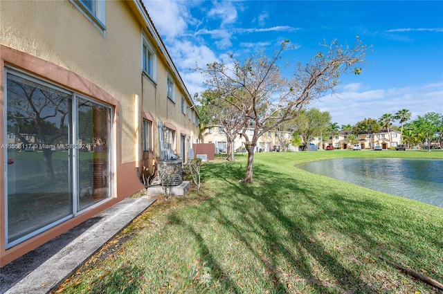 view of yard with a water view