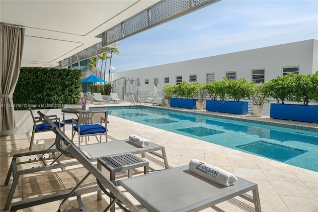 view of pool with a patio