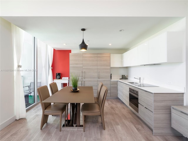 dining room featuring light hardwood / wood-style flooring