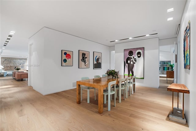 dining area with light wood-type flooring