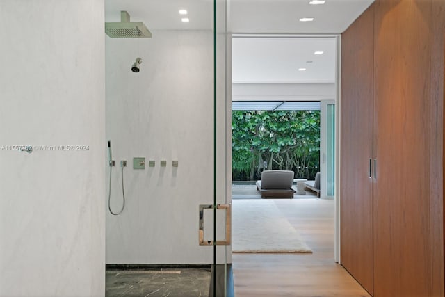 bathroom with wood-type flooring