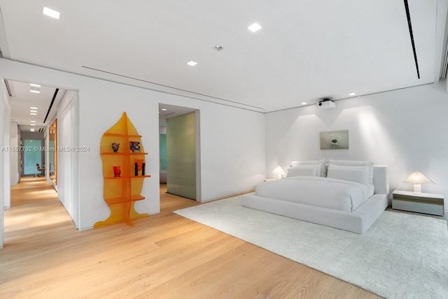 bedroom featuring light hardwood / wood-style floors