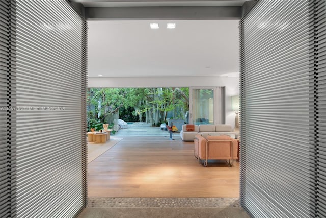 corridor featuring wood-type flooring