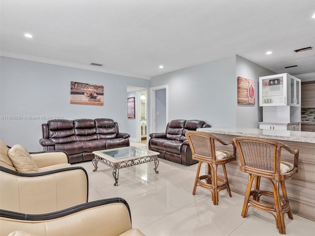 tiled living room with crown molding