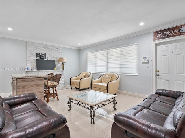 living room featuring ornamental molding and light tile flooring