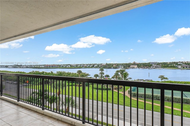 balcony featuring a water view