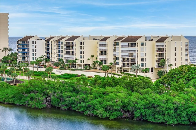 view of property with a water view