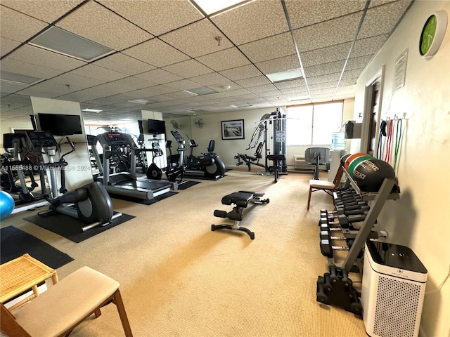 gym featuring a paneled ceiling