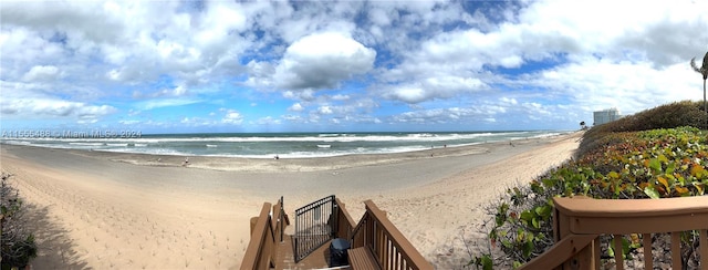 property view of water featuring a beach view