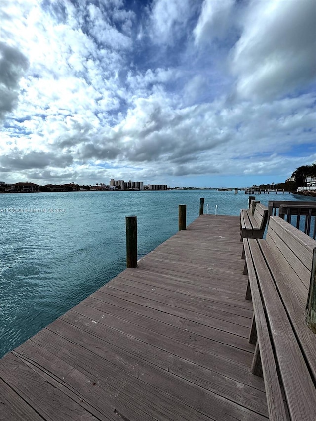 view of dock with a water view