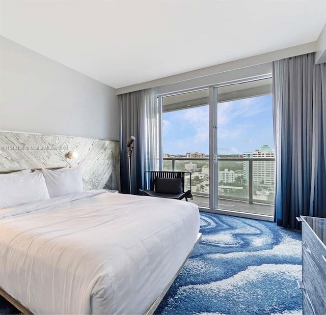 bedroom featuring dark carpet