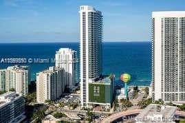 property's view of city with a water view