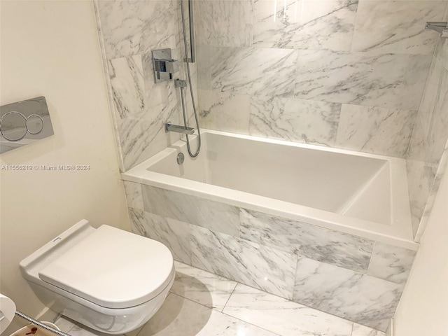 bathroom featuring toilet and tile flooring