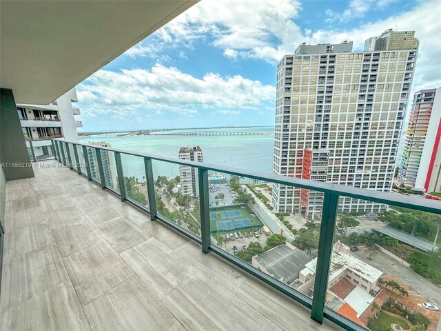 balcony featuring a water view