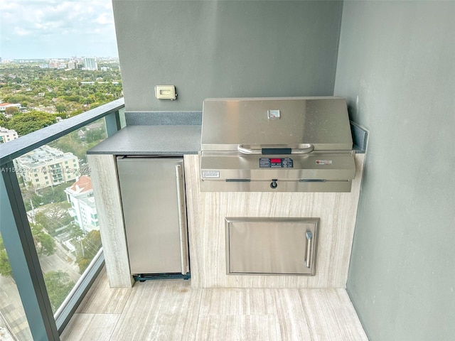 balcony featuring area for grilling