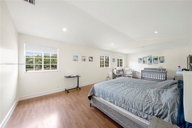 bedroom with light hardwood / wood-style floors