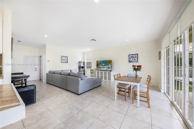 living room featuring light tile flooring