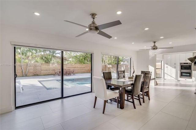 tiled dining room with ceiling fan