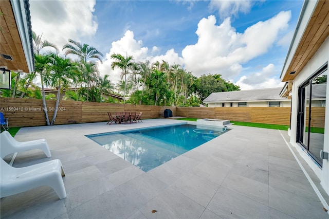 view of pool with a patio